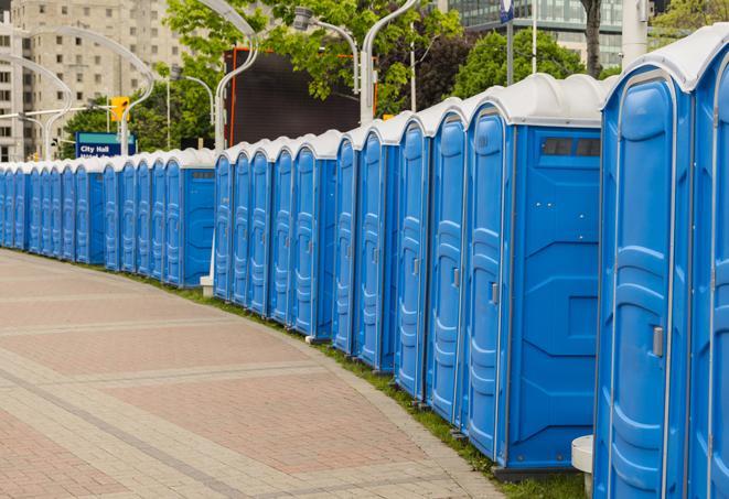 outdoor restroom setup for a special event, with sleek and modern portable restrooms in Afton